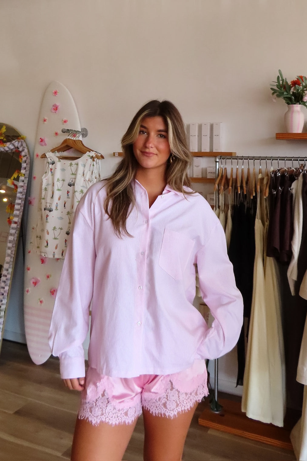 Pink, striped button down shirt with collared neckline, drop shoulder, button cuffs, front pocket, and oversized fit | Pixelated Boutique, Virginia Beach Clothing Stores, Clothing Stores in Virginia Beach, Virginia Beach Boutique, 757 Boutique, Beach Fashion, Vacation Style, Coastal Cowgirl Aesthetic