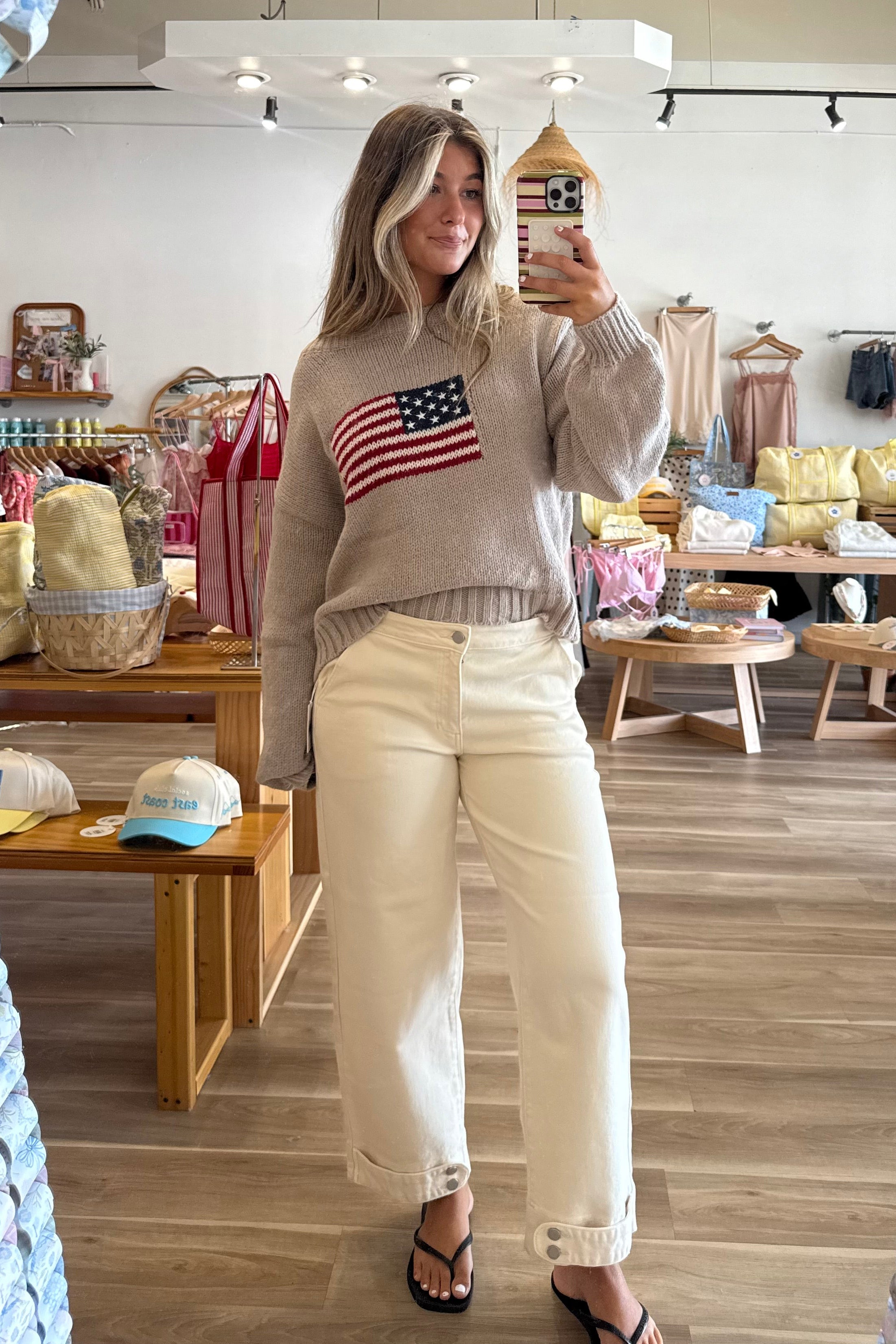 Cream, high-rise barrel jeans with curved leg and cuffed finish with buttons