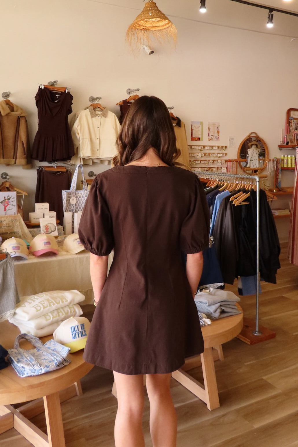 Brown, mini dress with V neckline, puff sleeves, pleated front, and A-line fit | Pixelated Boutique, Boutique Shopping in Virginia Beach, Women’s Boutique, Fall Fashion, Fall Dresses, Fall Shopping, Trendy Fall Outfits, Women’s Fall Clothing, Casual Fall Outfits