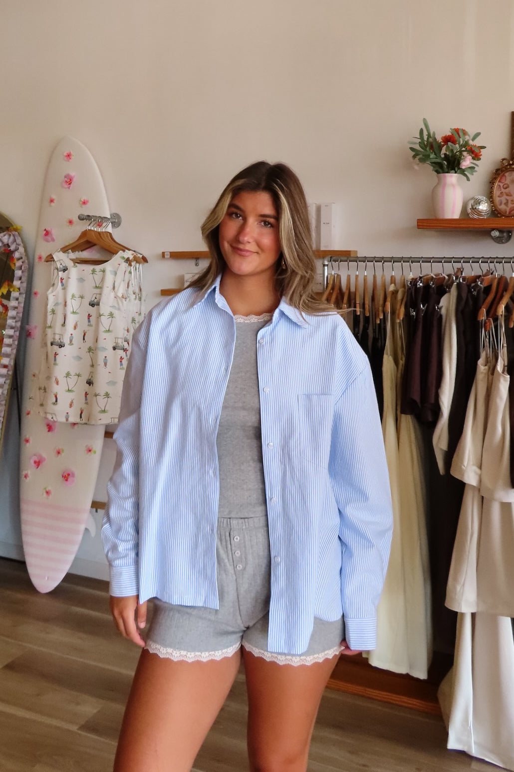 Blue, striped button down shirt with collared neckline, drop shoulder, button cuffs, front pocket, and oversized fit | Pixelated Boutique, Statement Jacket, Fall Fashion, Stylish Women’s Jacket, Fall Outerwear, Autumn Fashion, Fall Outfits Women, Fall Fashion 2026, Faux Leather Jacket, Women’s Jackets, Women’s Layering Pieces, Fall Outerwear Women