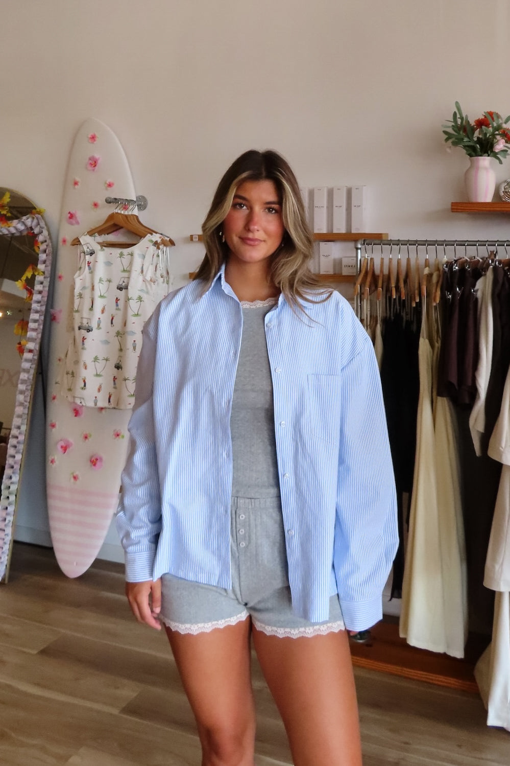 Blue, striped button down shirt with collared neckline, drop shoulder, button cuffs, front pocket, and oversized fit | Pixelated Boutique, Statement Jacket, Fall Fashion, Stylish Women’s Jacket, Fall Outerwear, Autumn Fashion, Fall Outfits Women, Fall Fashion 2026, Faux Leather Jacket, Women’s Jackets, Women’s Layering Pieces, Fall Outerwear Women