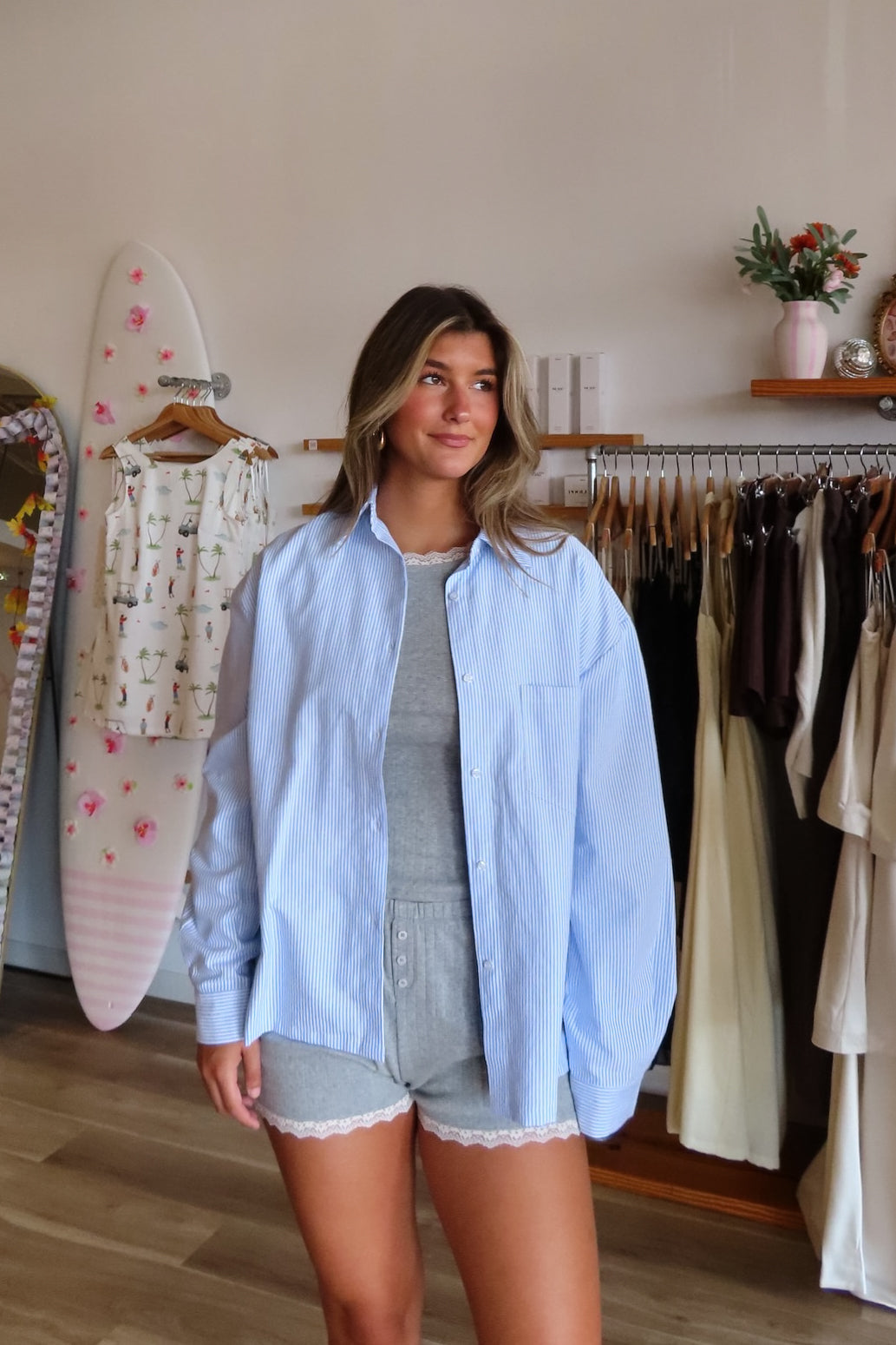 Blue, striped button down shirt with collared neckline, drop shoulder, button cuffs, front pocket, and oversized fit | Pixelated Boutique, Statement Jacket, Fall Fashion, Stylish Women’s Jacket, Fall Outerwear, Autumn Fashion, Fall Outfits Women, Fall Fashion 2026, Faux Leather Jacket, Women’s Jackets, Women’s Layering Pieces, Fall Outerwear Women