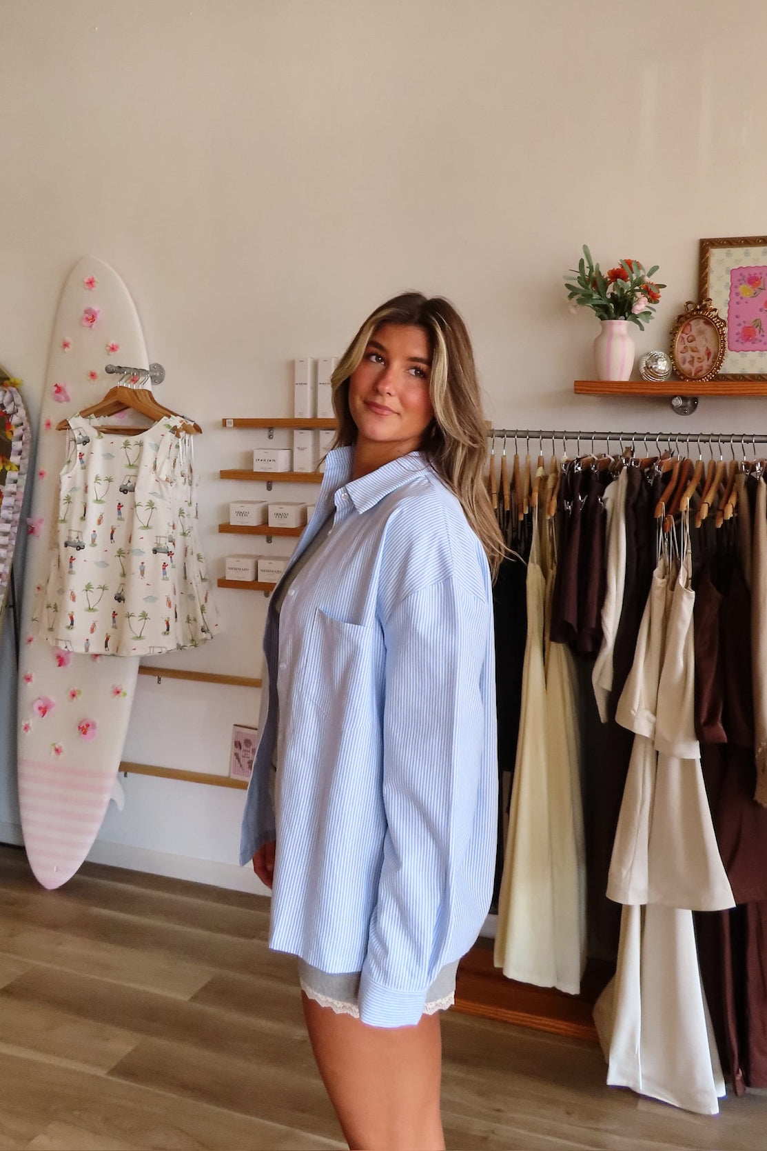 Blue, striped button down shirt with collared neckline, drop shoulder, button cuffs, front pocket, and oversized fit | Pixelated Boutique, Statement Jacket, Fall Fashion, Stylish Women’s Jacket, Fall Outerwear, Autumn Fashion, Fall Outfits Women, Fall Fashion 2026, Faux Leather Jacket, Women’s Jackets, Women’s Layering Pieces, Fall Outerwear Women