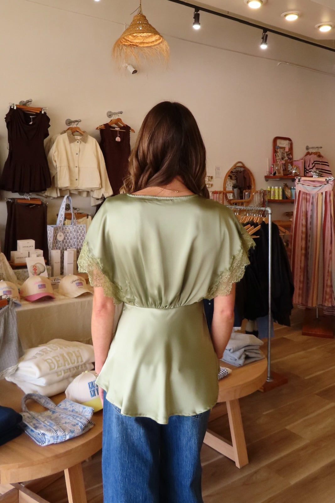 Green, satin blouse with V neckline, lace trim, short sleeves, side zipper, and lining | Pixelated Boutique, Online Shopping for Women, Women’s Boutique Clothing, Boutique Clothing for Women, Coastal Aesthetic Clothing, Vacation Outfits, Beach Boutique, Beach Outfits, Business Casual 