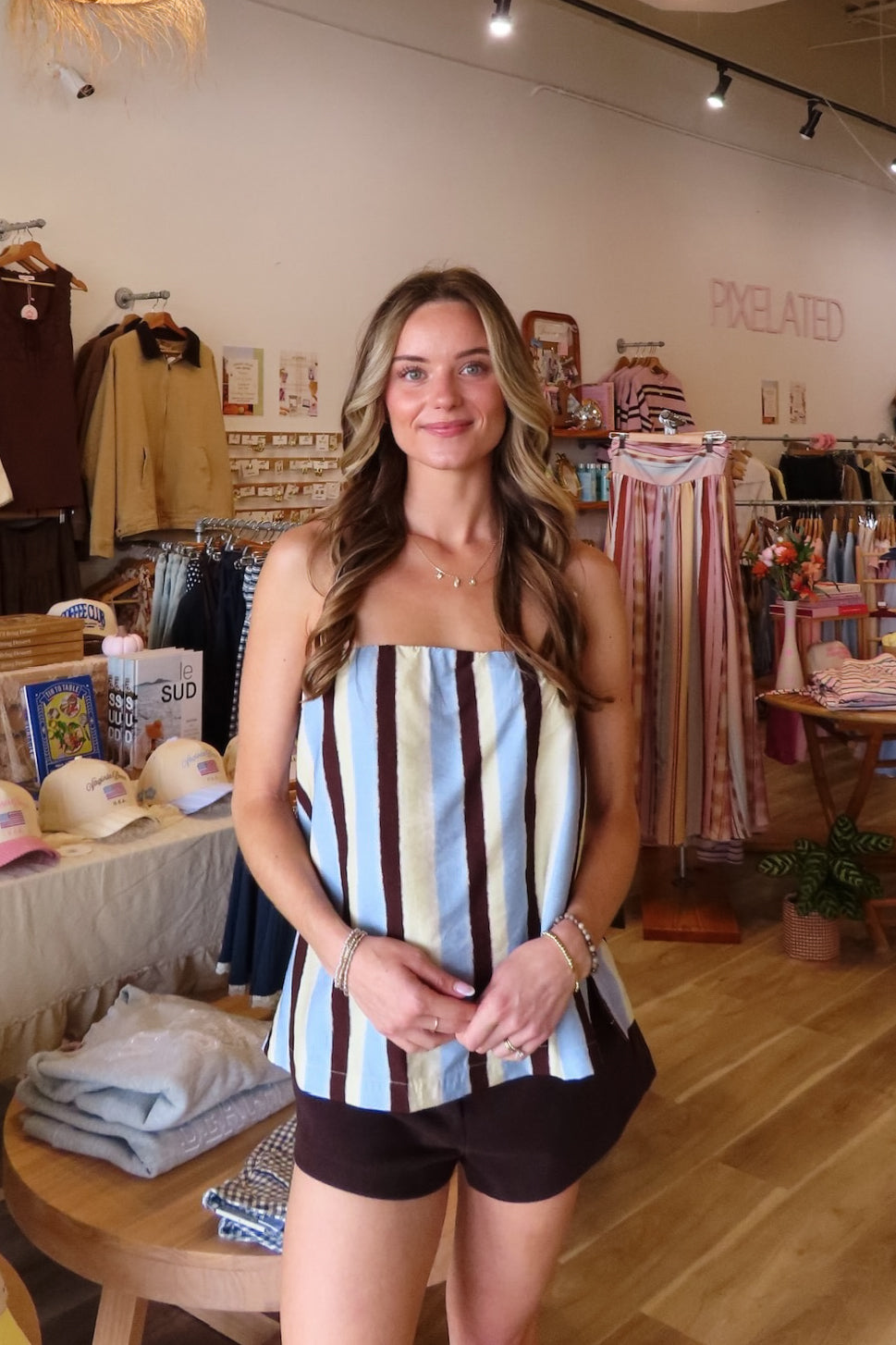 Blue, striped tube top with strapless neckline, full length, and relaxed fit | Pixelated Boutique, Virginia Beach Clothing Stores, Clothing Stores in Virginia Beach, Virginia Beach Boutique, 757 Boutique, Beach Fashion, Vacation Style, Coastal Cowgirl Aesthetic