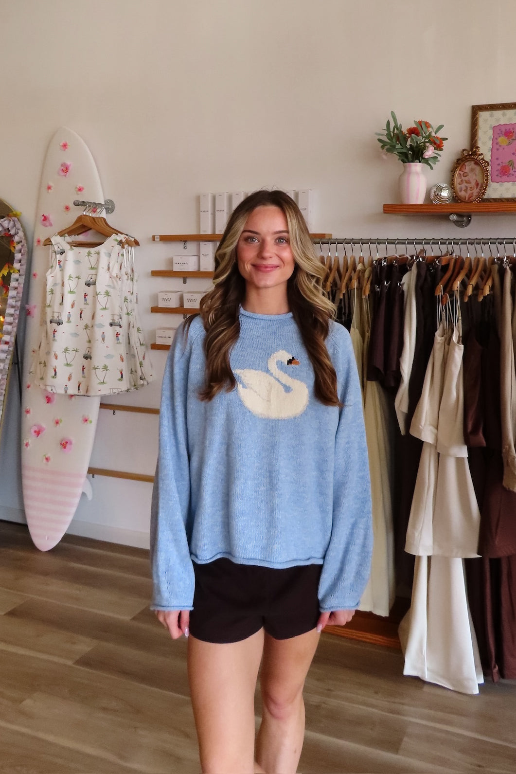 Blue, swan graphic sweater with rolled edges and balloon sleeves | Pixelated Boutique, Boutique Shopping in Virginia Beach, Loungewear Set, Chic Lounge Set, Matching Lounge Set, Women’s Loungewear, Lounge Set for Winter, Cozy Fall Outfit, Back to School Shopping, Fall Fashion 