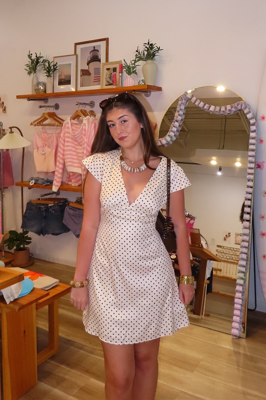 Cream, polka dot mini dress with V neckline, cap sleeves, and back tie, beach fashion, beach outfits, women’s boutique clothing, boutique clothing for women, coastal cowgirl outfits, coastal aesthetic clothing, business casual, concert outfit, 2000s fashion, western outfits