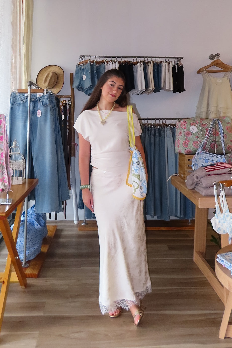 Cream, satin jacquard midi skirt with bias cut, lace trim, front bow, and side zipper, lace midi skirt, eyelet lace maxi skirt, summer maxi skirt, lace midi skirt for summer, bridal outfits, graduation dress, lace skirt for summer, beach fashion, coastal cowgirl aesthetic, beach girl outfits