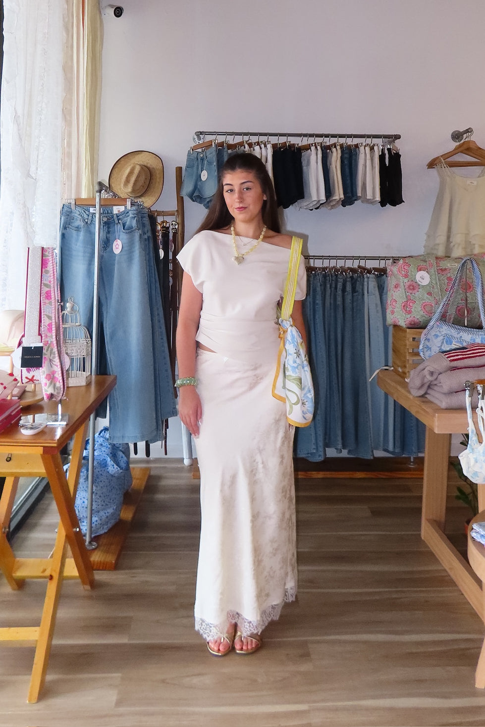 Cream, satin jacquard midi skirt with bias cut, lace trim, front bow, and side zipper
