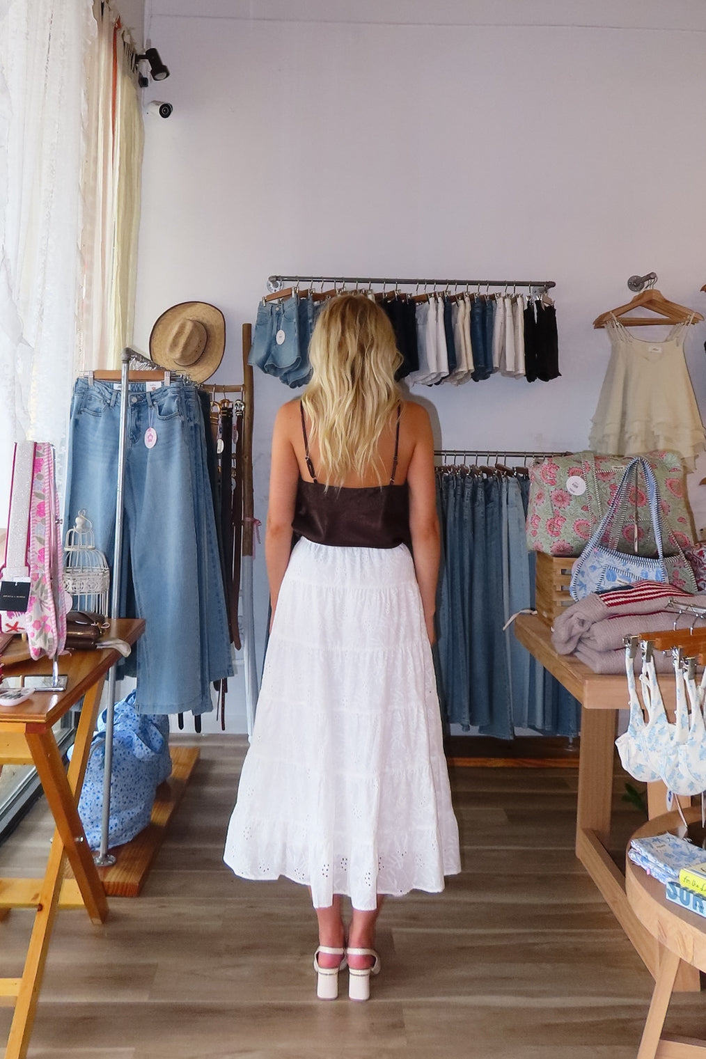 White, eyelet maxi skirt with ruffled tiers, elastic waistband, and drawstring, lace midi skirt, eyelet lace maxi skirt, summer maxi skirt, lace midi skirt for summer, bridal outfits, graduation dress, lace skirt for summer, beach fashion, coastal cowgirl aesthetic, beach girl outfits