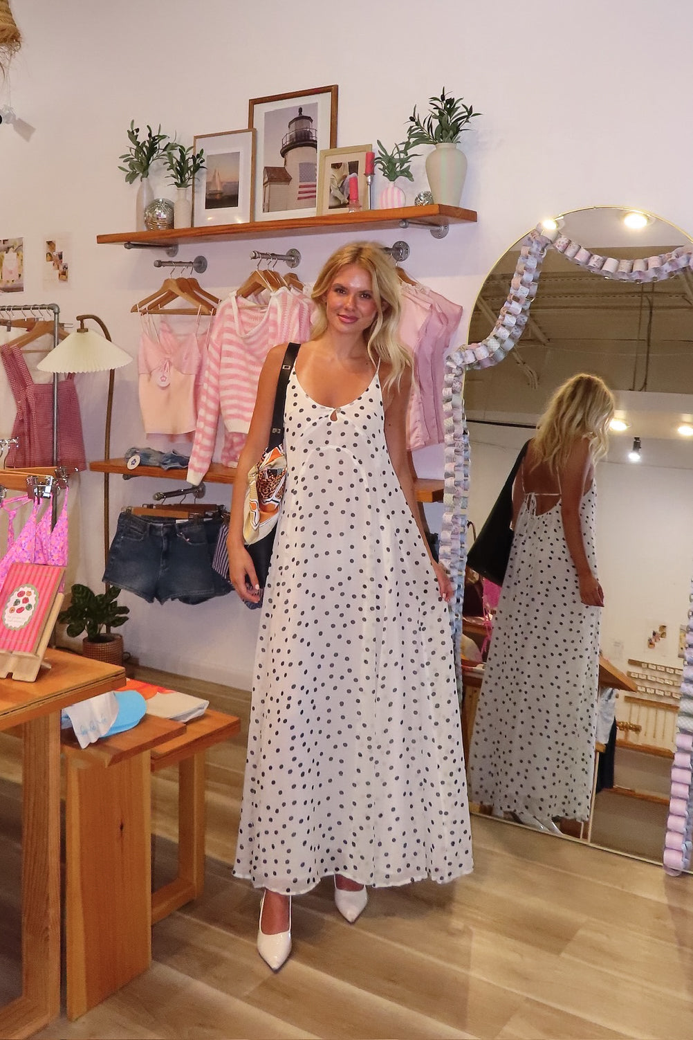 Cream, polka dot maxi dress with V neckline, keyhole cutout with button, back tie, and cross straps, Pixelated Boutique, 757 Boutique, fashion, summer aesthetic, women’s trendy summer outfit, spring break, vacation style, vacation outfits, beach boutique, beach fashion, beach outfits, coastal aesthetic clothing, maxi dress, formal dress, wedding guest dress, satin slip dress, prom dress, graduation party dress