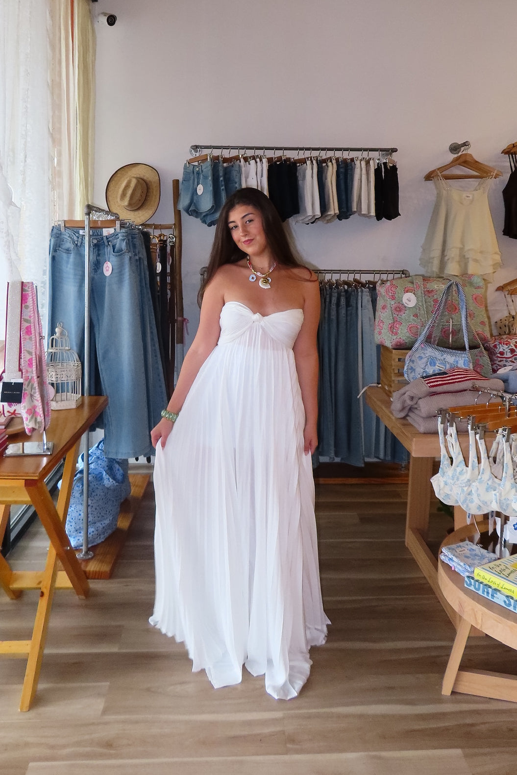 White, strapless maxi dress with sweetheart neckline, ruched bust with knot, and asymmetric ruffled hem
Virginia Beach Boutique, 757 Boutique, fashion, summer aesthetic, women’s trendy summer outfit, spring break, vacation style, vacation outfits, beach boutique, beach fashion, beach outfits, coastal aesthetic clothing, maxi dress, formal dress, wedding guest dress, satin slip dress, prom dress, graduation party dress