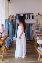 White, strapless maxi dress with sweetheart neckline, ruched bust with knot, and asymmetric ruffled hem
Virginia Beach Boutique, 757 Boutique, fashion, summer aesthetic, women’s trendy summer outfit, spring break, vacation style, vacation outfits, beach boutique, beach fashion, beach outfits, coastal aesthetic clothing, maxi dress, formal dress, wedding guest dress, satin slip dress, prom dress, graduation party dress