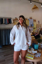 White, eyelet lace broderie shirt with button down, collar, and drop shoulder | Pixelated Boutique, Eyelet lace matching set, white lace top, eyelet lace, button up shirt, women's button down shirt, vacation style, vacation outfit