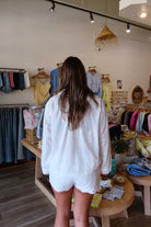 White, eyelet lace broderie shirt with button down, collar, and drop shoulder | Pixelated Boutique, Eyelet lace matching set, white lace top, eyelet lace, button up shirt, women's button down shirt, vacation style, vacation outfit