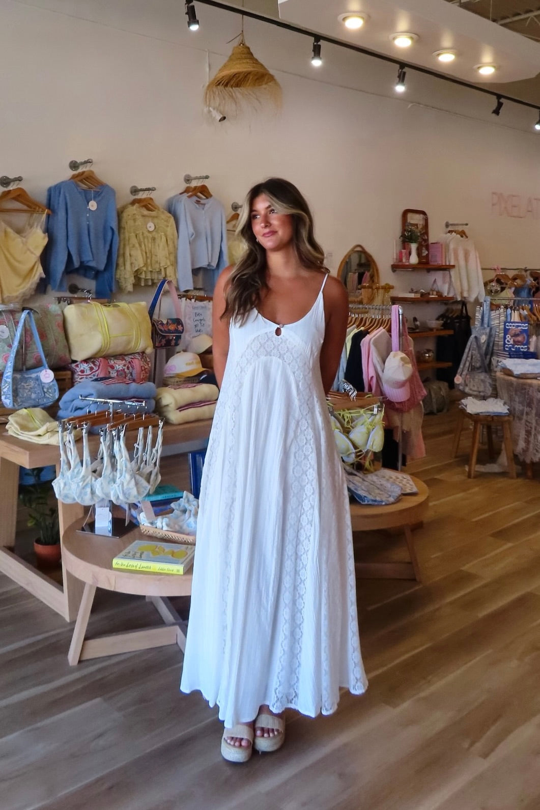 White, textured lace maxi dress with V neckline, front keyhole button, and adjustable open back, white maxi dress, white lace dress, boho maxi dress, bridal shower dress, bachelorette dress, graduation dress
