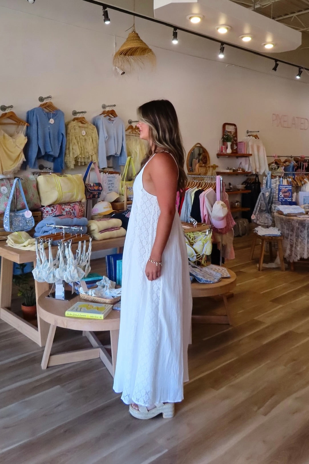 White, textured lace maxi dress with V neckline, front keyhole button, and adjustable open back, white maxi dress, white lace dress, boho maxi dress, bridal shower dress, bachelorette dress, graduation dress
