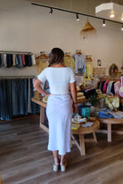 White, linen midi skirt with lace trim, lined interior, elastic waistband, and side zipper | Pixelated Boutique, 757 Boutique, Virginia Beach Clothing Stores, Lace skirt, Linen skirt, Lace maxi skirt, Business casual midi skirt, white midi skirt, white lace skirt, vacation outfits