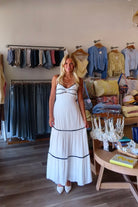 White, contrast trim maxi dress with sweetheart neckline, front keyhole, beaded straps, tiered hem, and back tie | Pixelated Boutique, Virginia Beach Boutique, white maxi dress, white lace dress, boho maxi dress, bridal shower dress, bachelorette dress, graduation dress