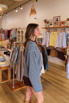 Blue and brown, striped top with long sleeves, drop shoulder, and oversized fit