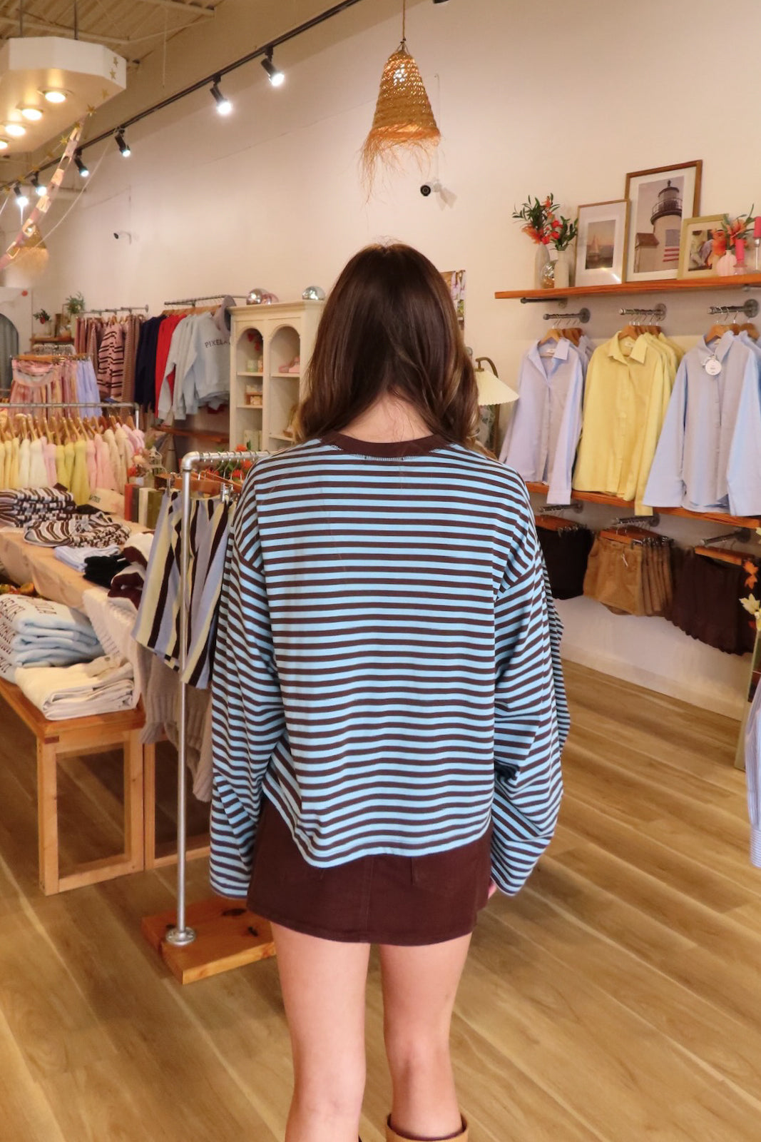 Blue and brown, striped top with long sleeves, drop shoulder, and oversized fit