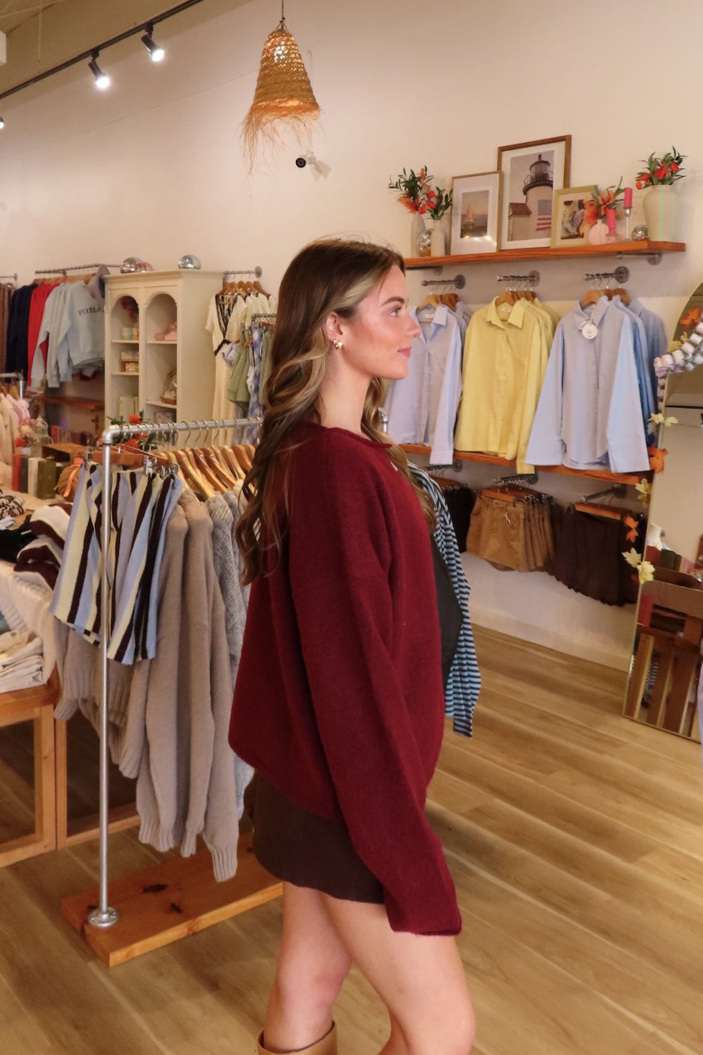 Red, rolled collar cardigan with button down, drop shoulder, and ribbed hem