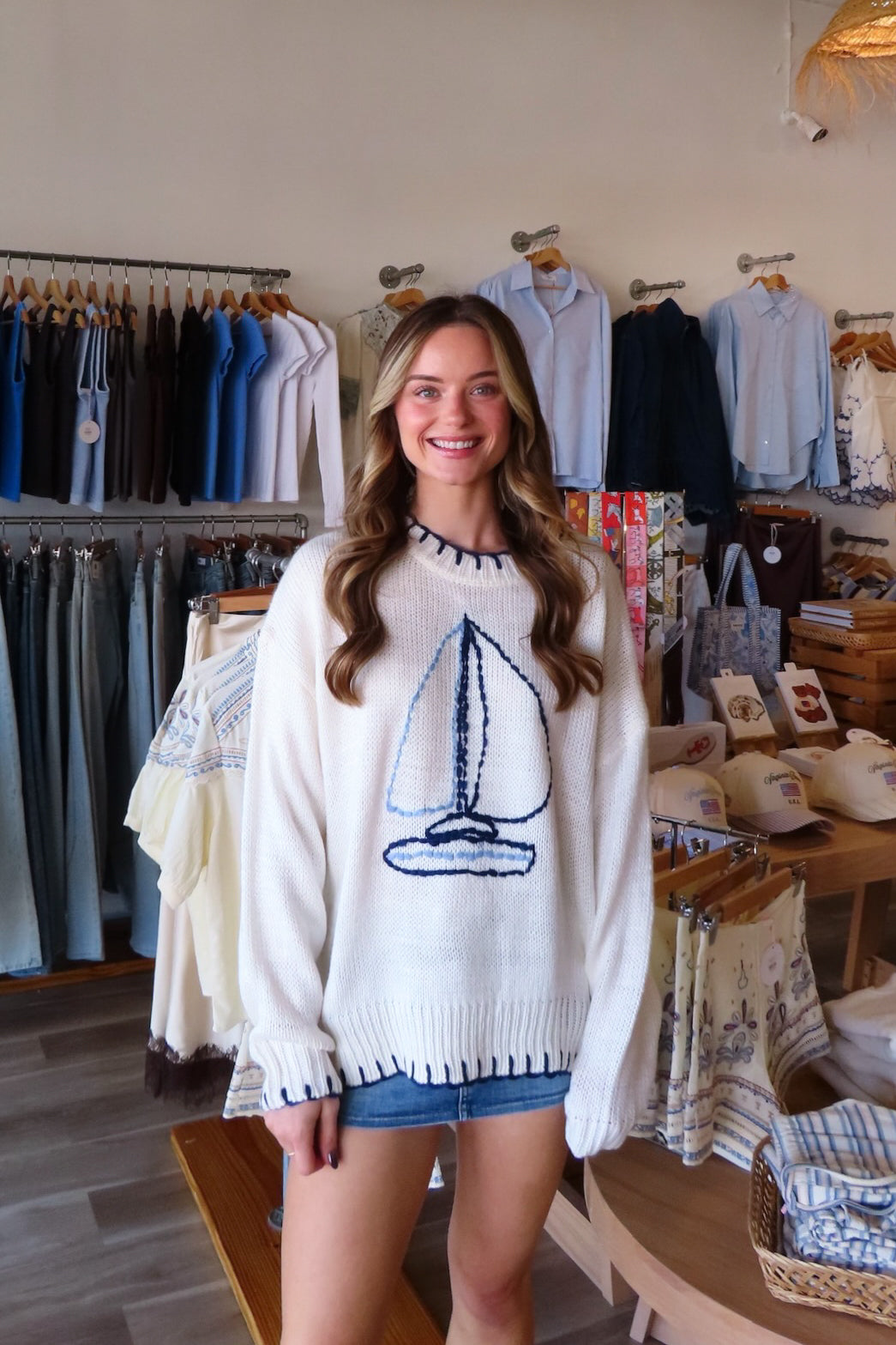 White, sweater with embroidered sailboat, crew neckline, and contrast stitching | Pixelated Boutique, Boutique Clothing in Virginia Beach, Statement Sweaters, Chunky Sweaters, Trendy Sweaters, Cozy Knit Sweaters for Women, Oversized Sweaters, Cute Fall Sweaters, Fall Fashion Inspiration  