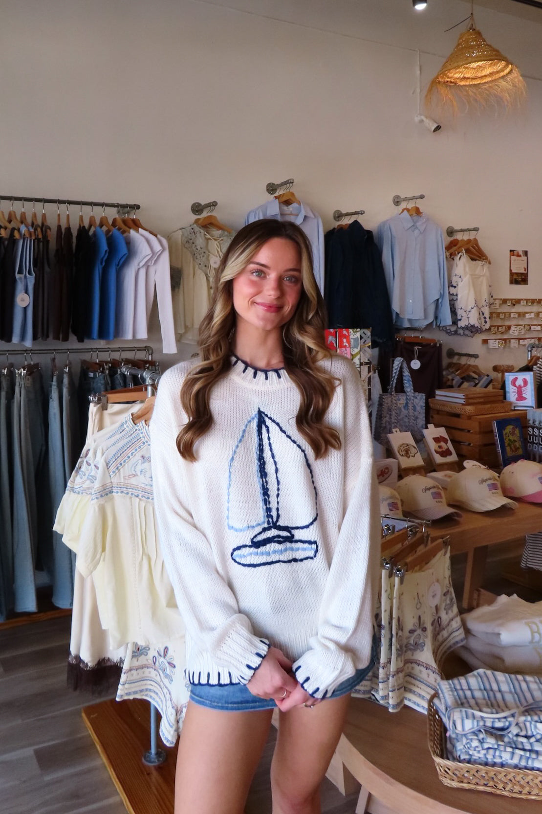 White, sweater with embroidered sailboat, crew neckline, and contrast stitching | Pixelated Boutique, Boutique Clothing in Virginia Beach, Statement Sweaters, Chunky Sweaters, Trendy Sweaters, Cozy Knit Sweaters for Women, Oversized Sweaters, Cute Fall Sweaters, Fall Fashion Inspiration  