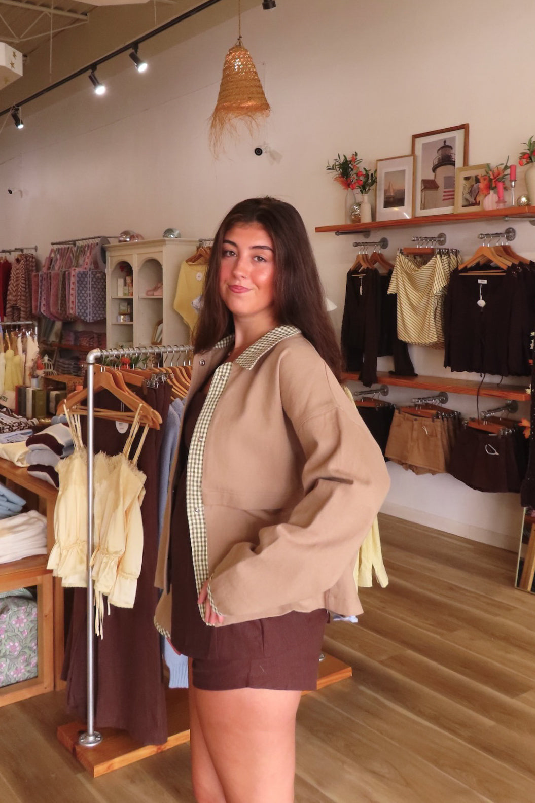 Brown, canvas jacket with green and white gingham contrast, collar, snap buttons, and oversized fit | Pixelated Boutique, Statement Jacket, Fall Fashion, Stylish Women’s Jacket, Fall Outerwear, Autumn Fashion, Fall Outfits Women, Fall Fashion 2026, Faux Leather Jacket, Women’s Jackets, Women’s Layering Pieces, Fall Outerwear Women