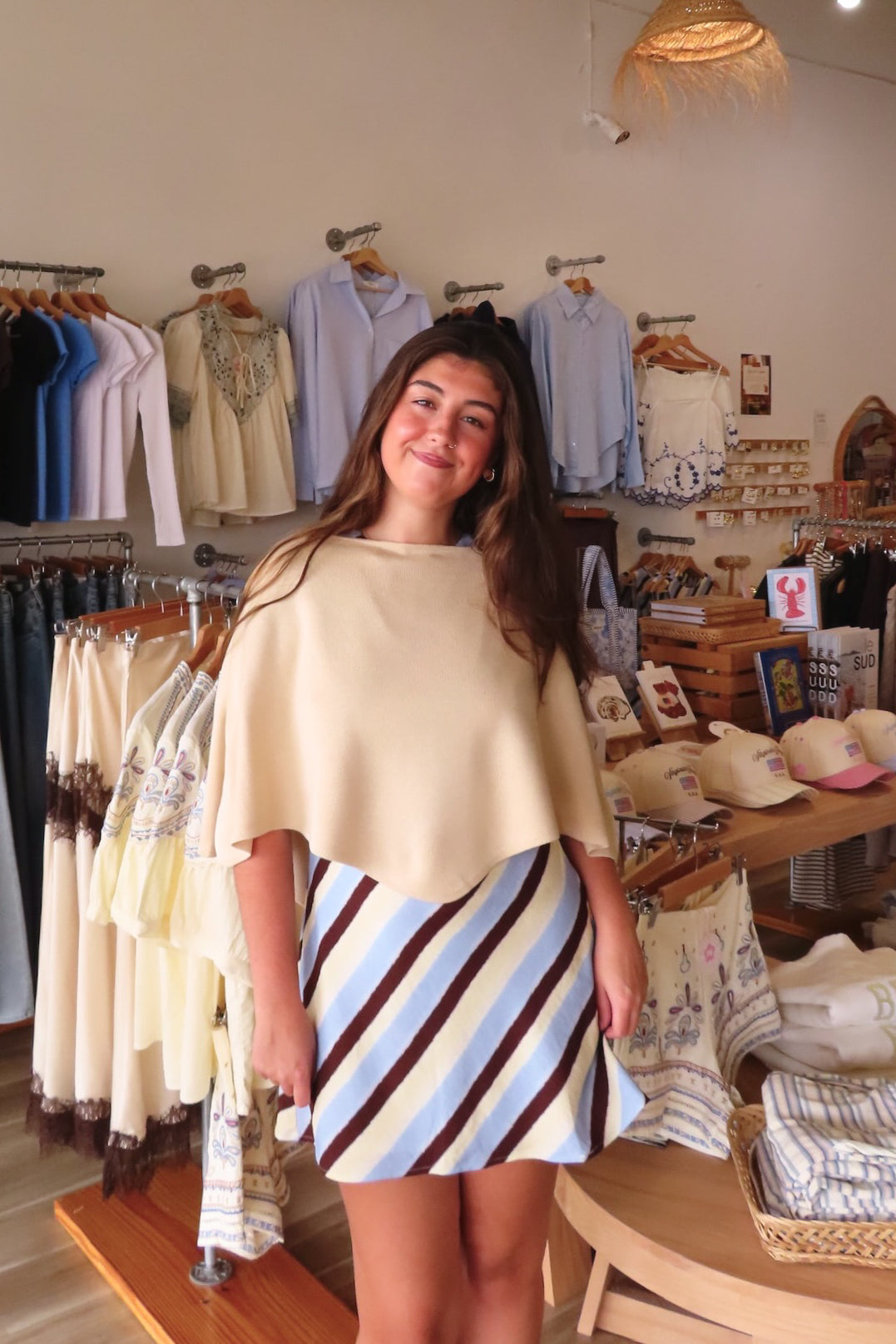 Cream, knit poncho with boat neckline and asymmetrical hem | Pixelated Boutique, Virginia Beach Clothing Stores, Clothing Stores in Virginia Beach, Virginia Beach Boutique, 757 Boutique, Beach Fashion, Vacation Style, Coastal Cowgirl Aesthetic