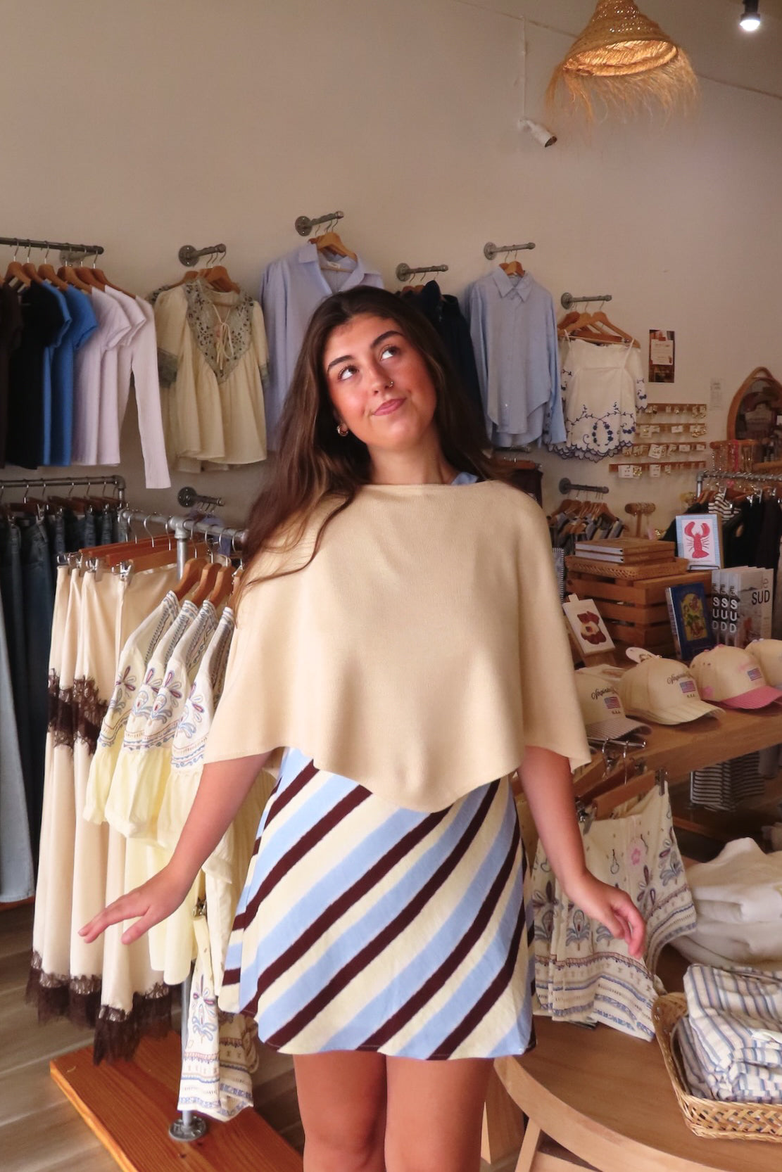 Cream, knit poncho with boat neckline and asymmetrical hem | Pixelated Boutique, Virginia Beach Clothing Stores, Clothing Stores in Virginia Beach, Virginia Beach Boutique, 757 Boutique, Beach Fashion, Vacation Style, Coastal Cowgirl Aesthetic