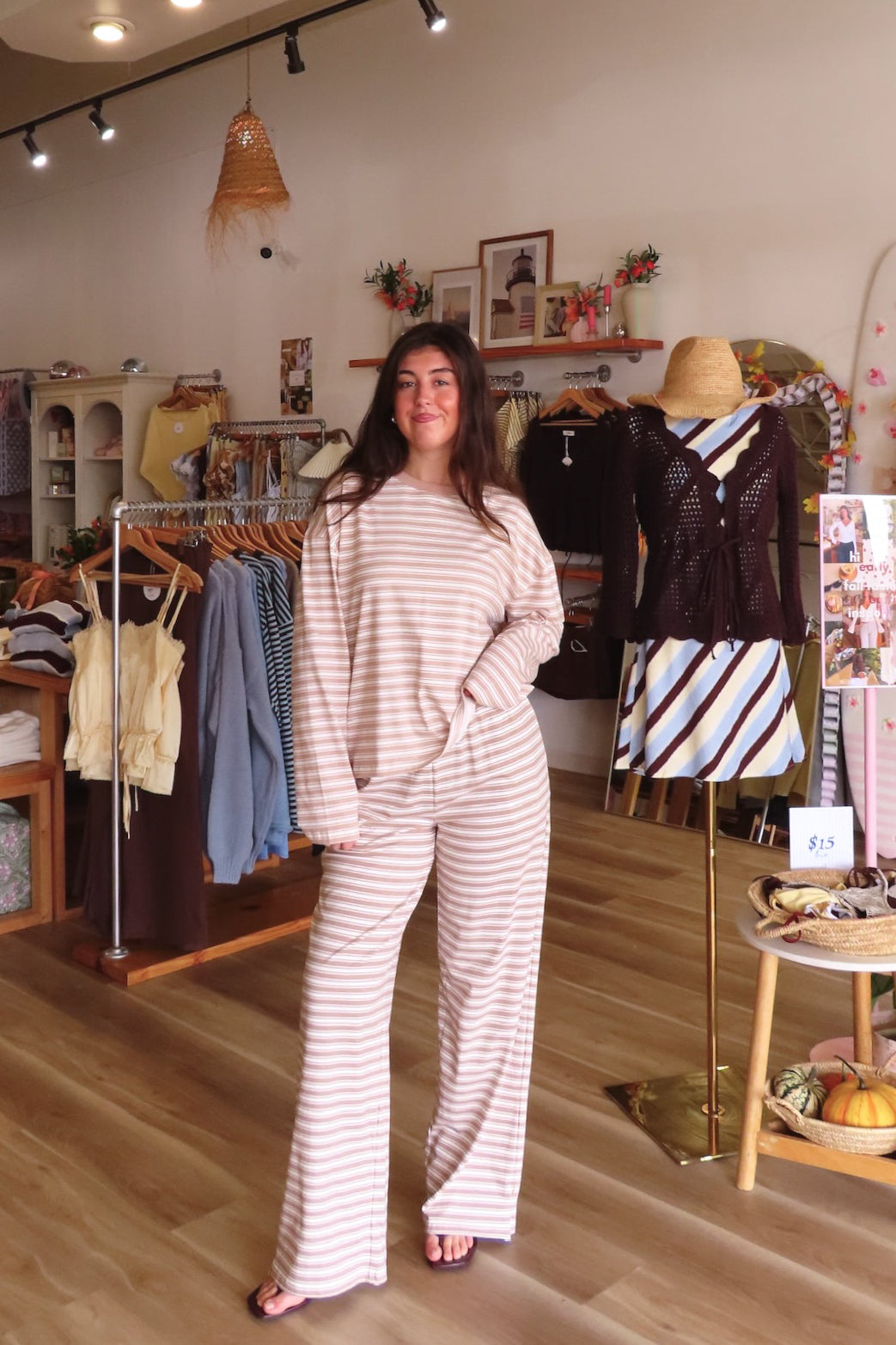 Tan, striped knit pants with wide leg, side pockets, and elastic waistband | Pixelated Boutique, Boutique Shopping in Virginia Beach, Loungewear Set, Chic Lounge Set, Matching Lounge Set, Women’s Loungewear, Lounge Set for Winter, Cozy Fall Outfit, Fall Fashion, Winter Layering, Winter Lounge Pants for Women