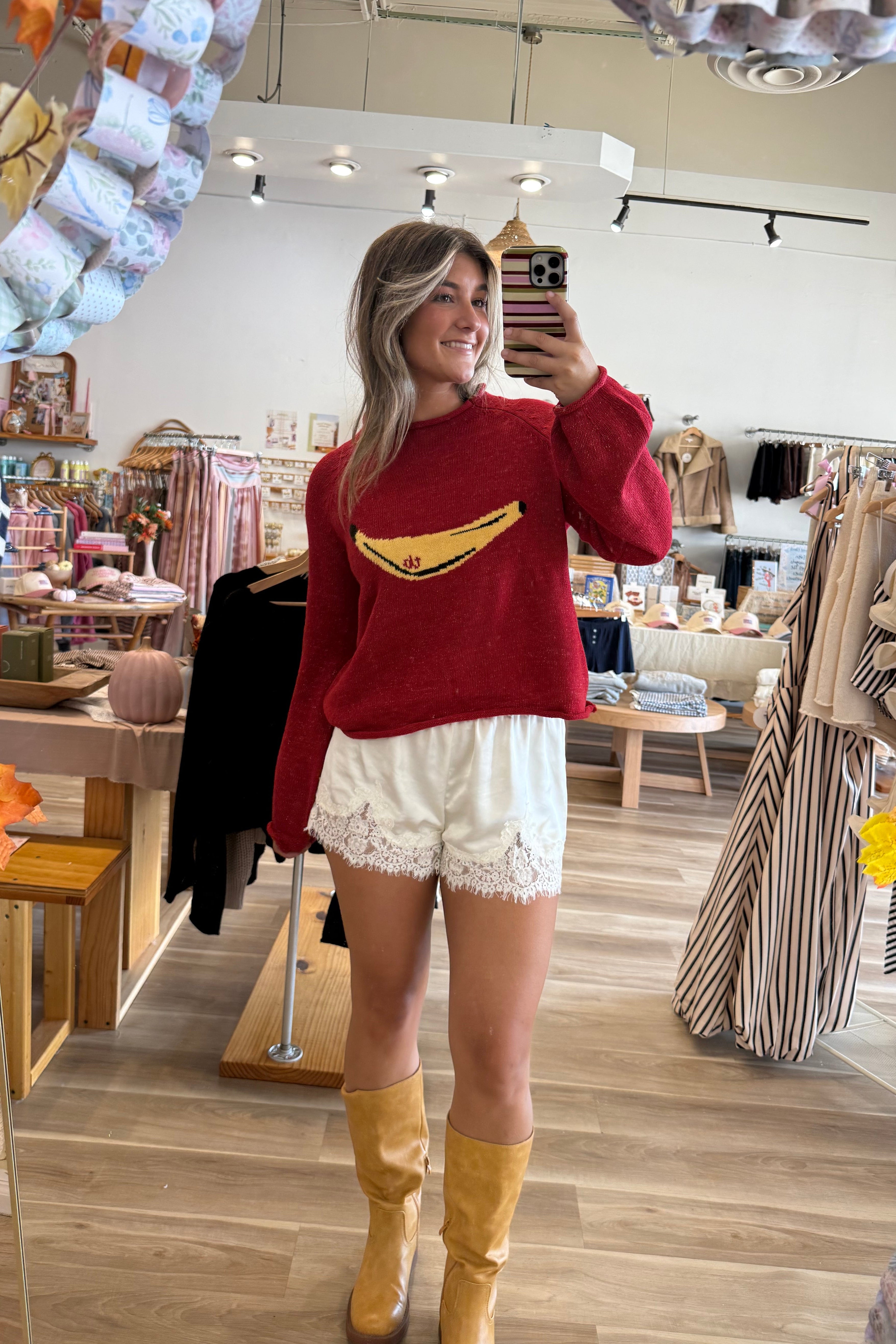 Red, banana graphic sweater with rolled edges and balloon sleeves | Pixelated Boutique, Boutique Clothing in Virginia Beach, Statement Sweaters, Chunky Sweaters, Trendy Sweaters, Cozy Knit Sweaters for Women, Oversized Sweaters, Cute Fall Sweaters, Fall Fashion Inspiration  
