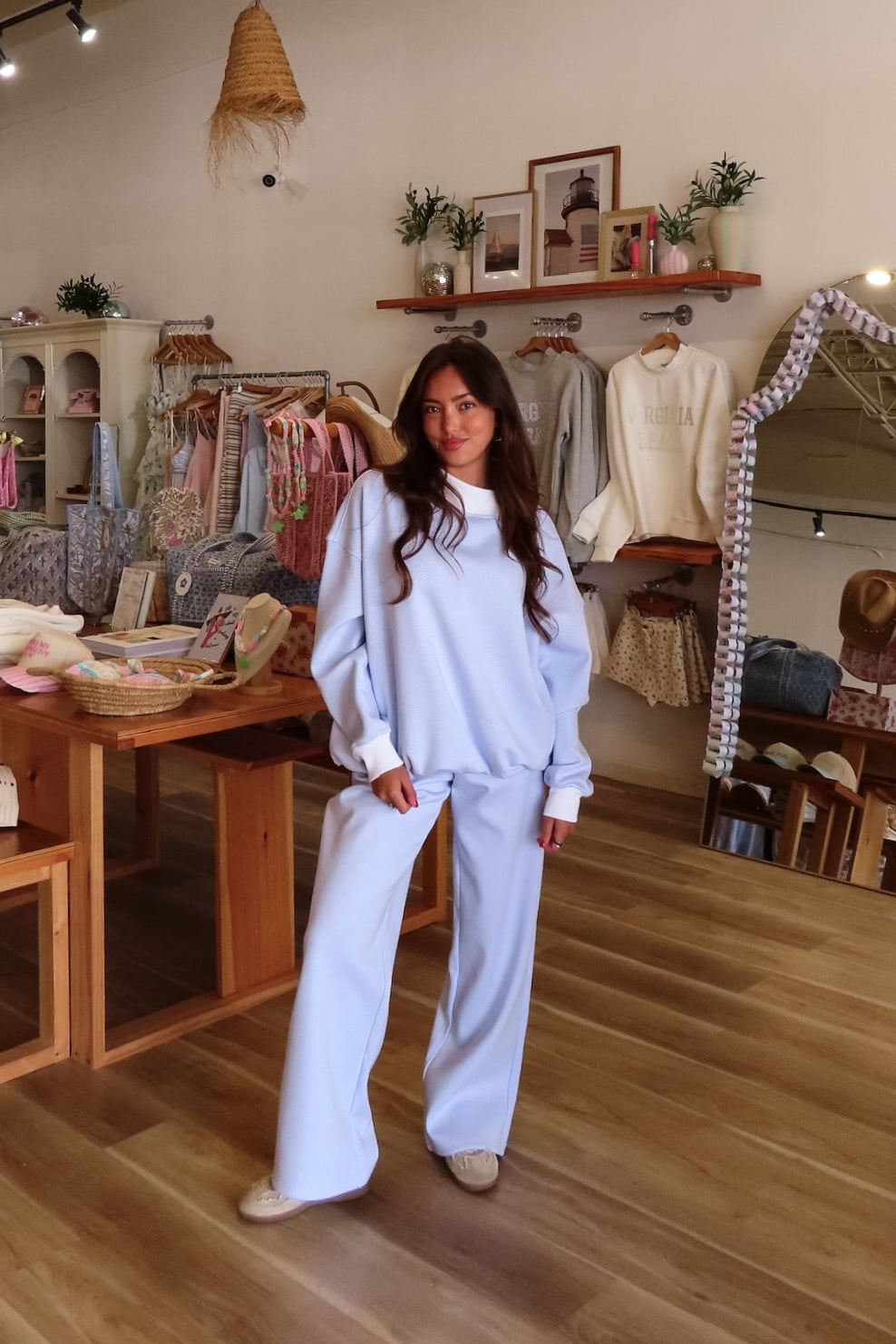 Blue and white, striped sweatpants with wide leg, elastic waist, contrast band, and side pockets.

By Sunkissed Coconut