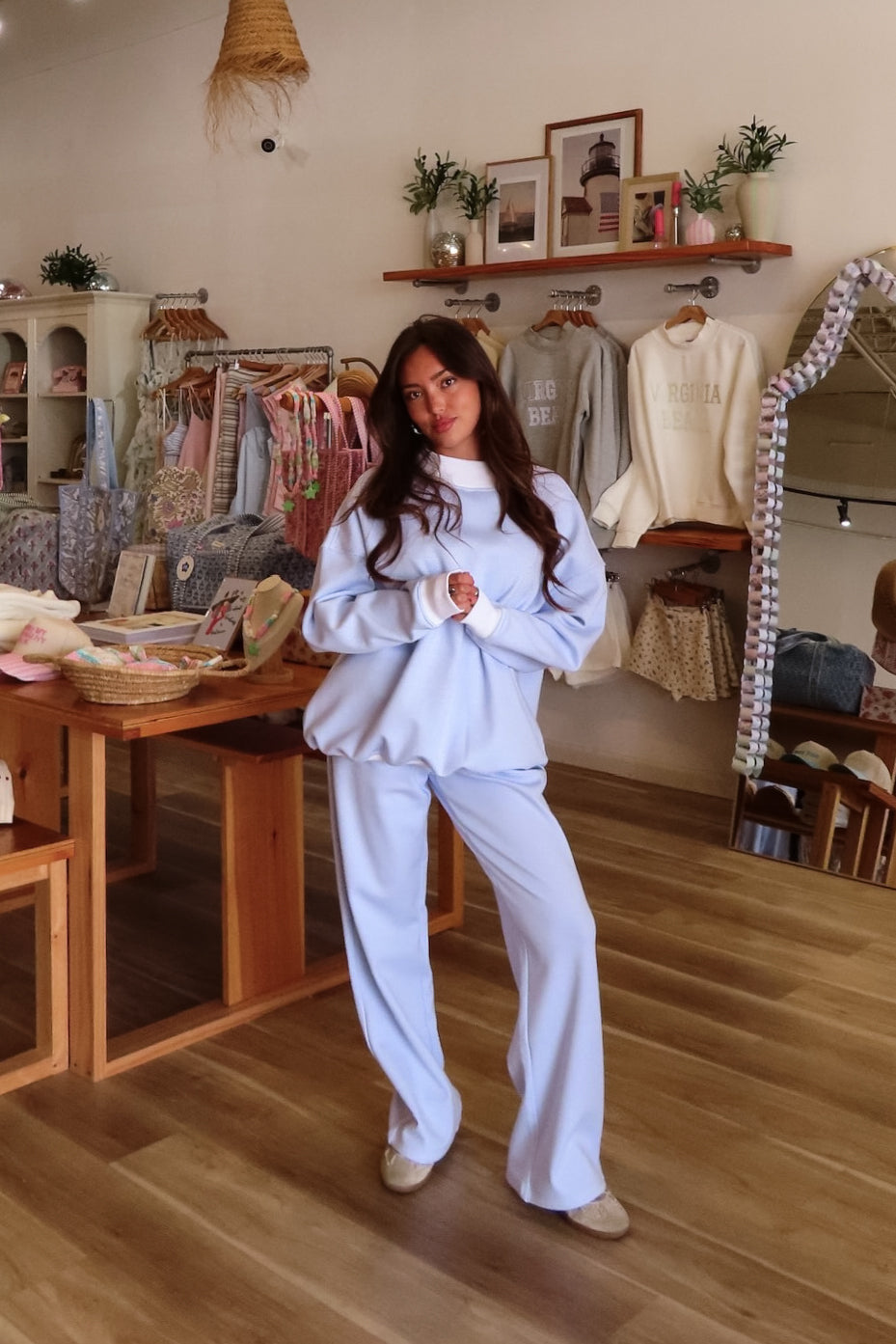 Blue and white, striped sweatpants with wide leg, elastic waist, contrast band, and side pockets.

By Sunkissed Coconut
