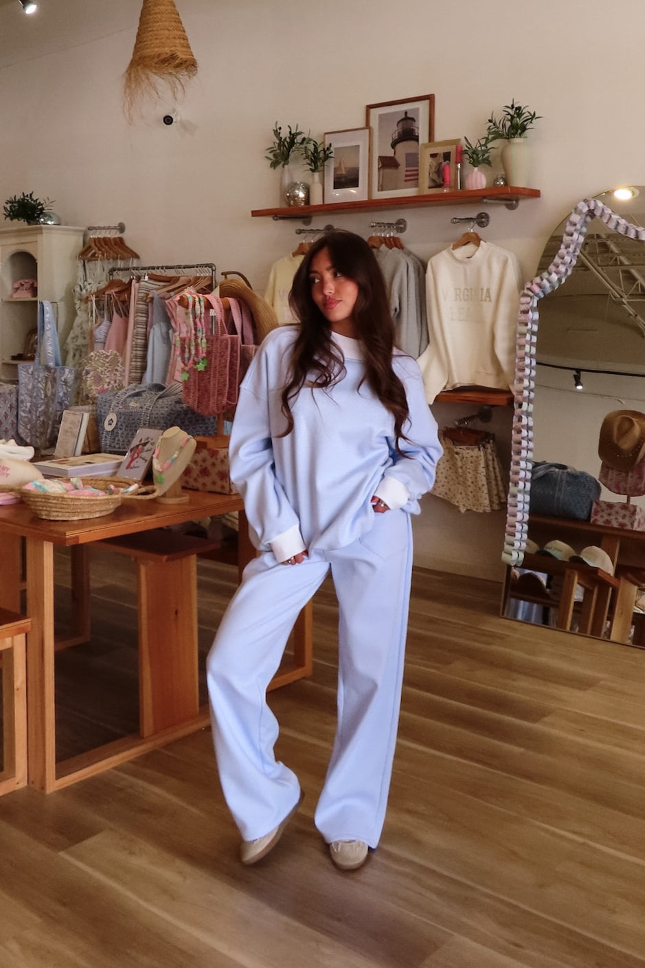 Blue and white, striped sweatpants with wide leg, elastic waist, contrast band, and side pockets.

By Sunkissed Coconut