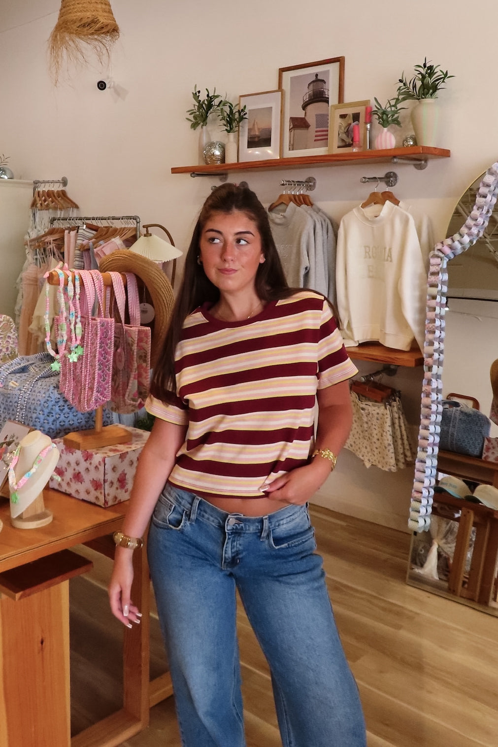 Red, yellow, white and pink striped boxy t-shirt with short sleeves and slight crop