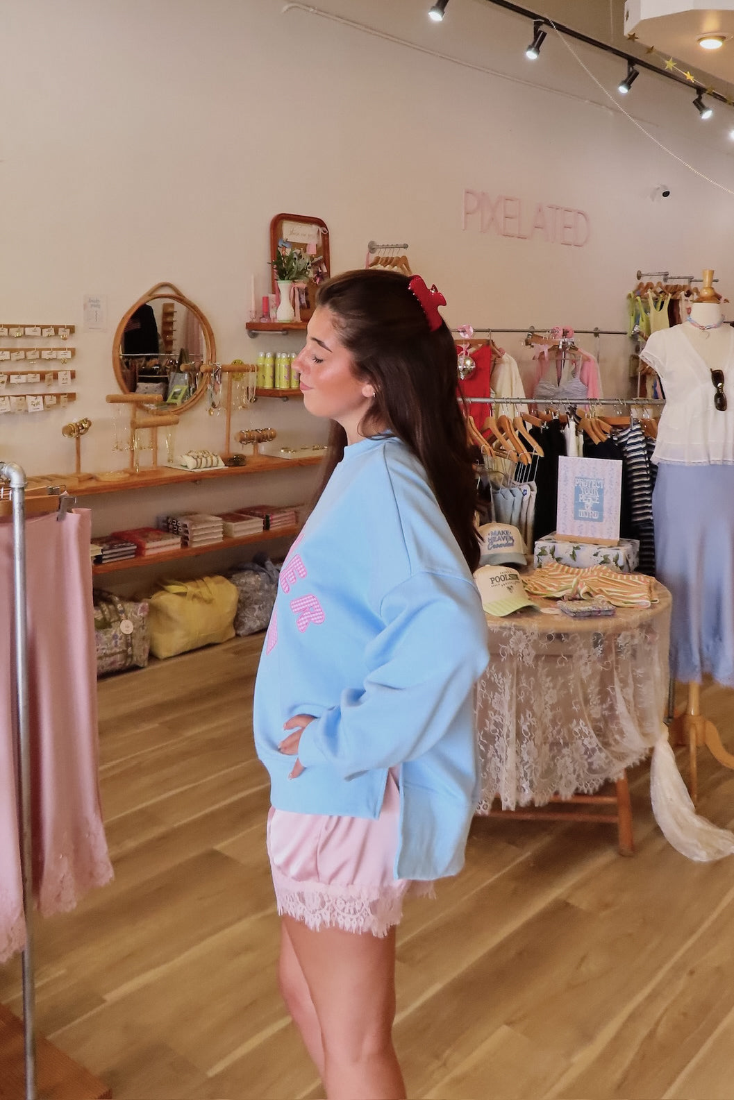 Blue, gingham heart and “MOTHER” embroidered in pink sweatshirt with crew neckline and fleece lining. Oversized and slightly cropped.

By The Beach Club