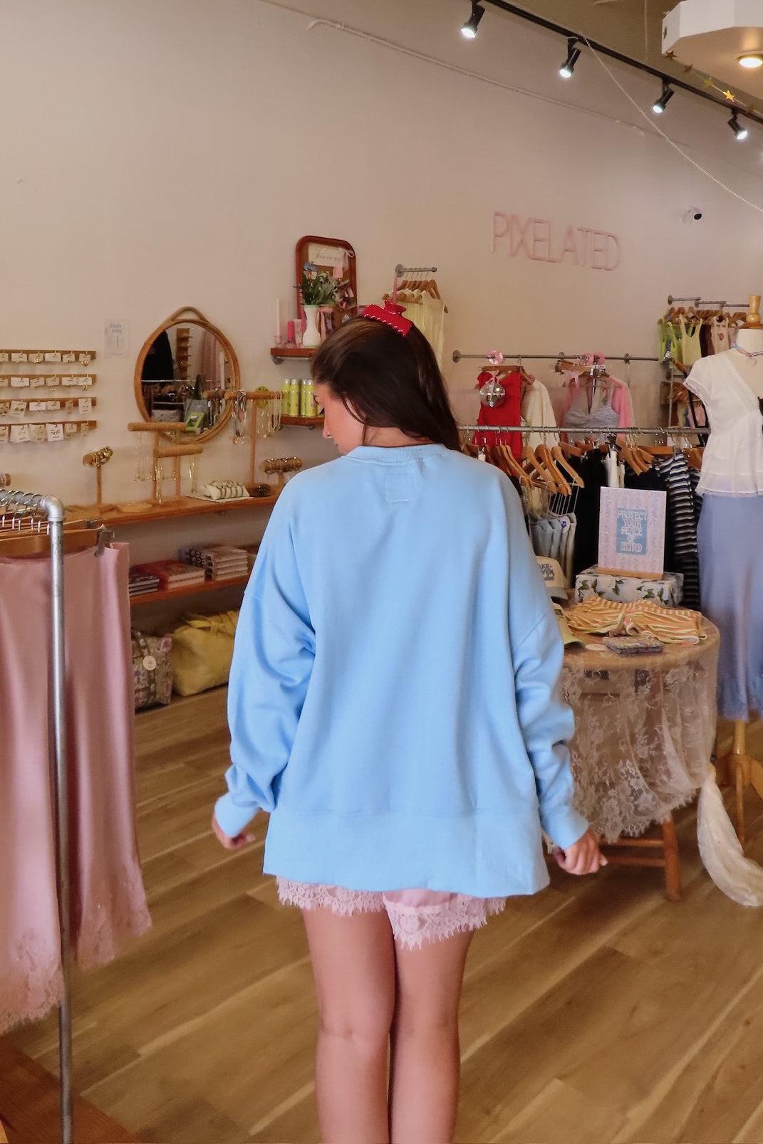 Blue, gingham heart and “MOTHER” embroidered in pink sweatshirt with crew neckline and fleece lining. Oversized and slightly cropped.

By The Beach Club