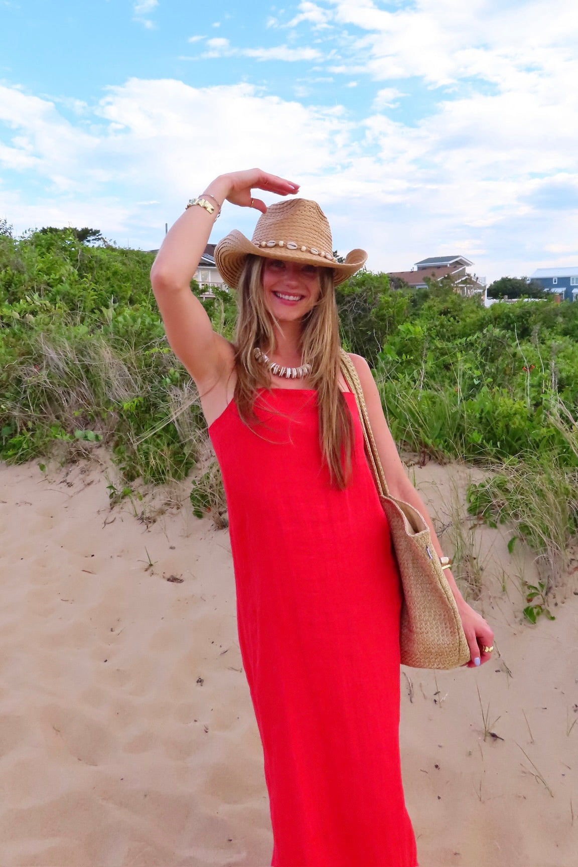 Red, linen maxi dress with straight neckline, adjustable cami straps, and flowy silhouette