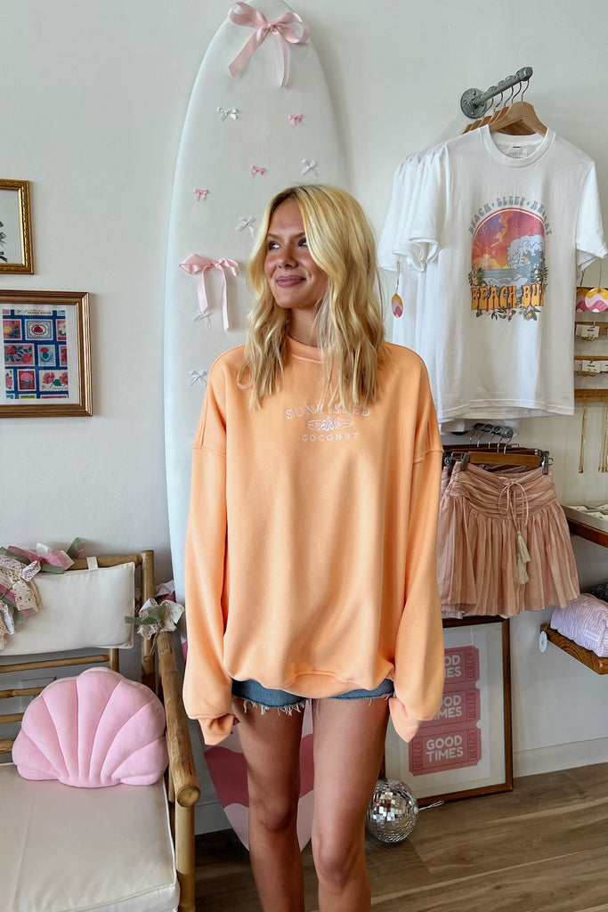 Orange Sunkissed Coconut Sweatshirt, Pixelated Boutique, Women's Clothing, Women's Jewelry and Gifts, Online Shopping for Women, Latest Fashion Trends, Women's Boutique Clothing, Virginia Beach, Clothing Stores in Virginia Beach, Rush Dresses, Graduation Dresses, Cute Clothes, Aesthetic Trends, Quality Jewelry, East Coast Styles, College Styles, Summer Styles, Swimwear
