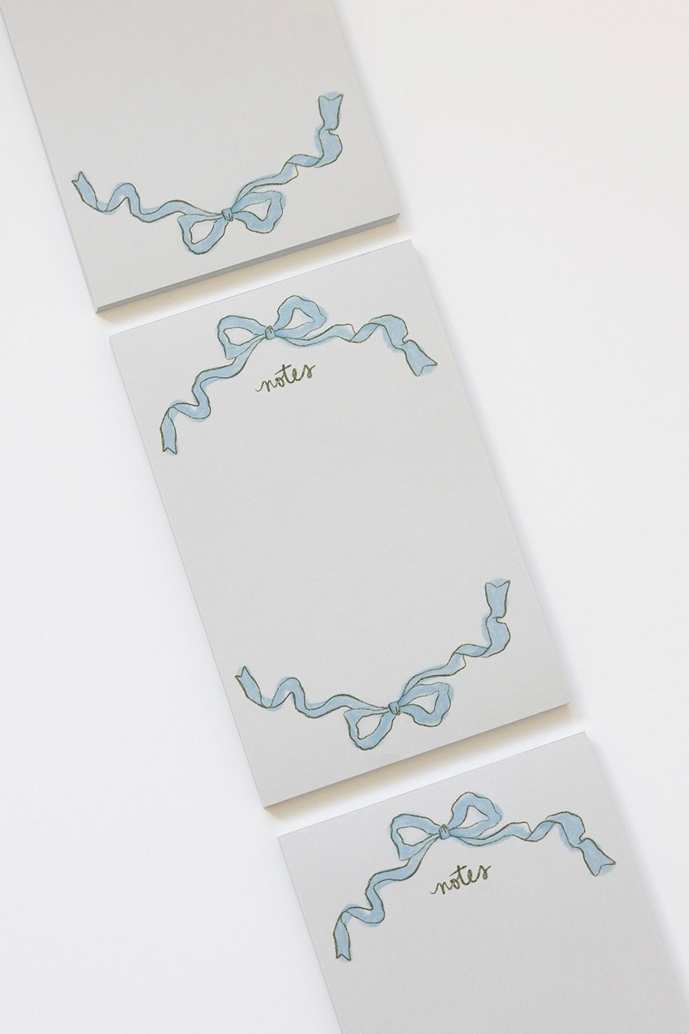 Blue Ribbon Bow Notepad, Pixelated Boutique, Women's Clothing, Women's Jewelry and Gifts, Online Shopping for Women, Latest Fashion Trends 2024, Virginia Beach Clothing Stores, Rush Dresses for Sorority Events, Graduation Dresses for 2024, Clothing Stores in Virginia Beach, Aesthetic Fashion Trends, East Coast Fashion Styles, Summer 2024 Fashion Trends, Sustainable Women's Clothing, Unique Gift Ideas for Women