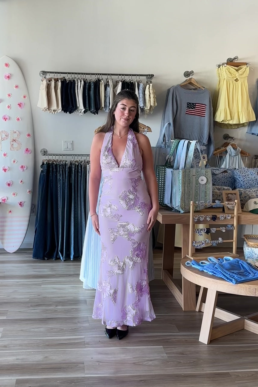 Purple, halter maxi dress with V neckline, floral lace appliques, neck scarf, and flared skirt
Pixelated Boutique, Women's Clothing, Online Shopping for Women, Fashion Trends 2026, Outfit Inspo, Virginia Beach Clothing Stores, Clothing Stores in Virginia Beach, Virginia Beach Boutique, 757 Boutique, fashion, spring aesthetic, women’s spring outfit, spring style, spring break, vacation style, vacation outfits, beach boutique, beach fashion, beach outfits, coastal aesthetic clothing, maxi dress, formal dress
