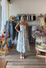 Blue, floral strapless maxi dress with ruched bust, flared hem, and smocked back, Pixelated Boutique, Women's Clothing, Virginia Beach Clothing Stores, Clothing Stores in Virginia Beach, Virginia Beach Boutique, 757 Boutique, Online Shopping for Women, summer aesthetic, brunch outfit, vacation style, vacation outfits, beach boutique