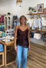 Brown, satin cami top with V neckline, asymmetric hem, scalloped lace trim, and adjustable straps, women’s lace going out top, date night lace top, asymmetrical hem top, girls night out top, vacation dinner outfit top