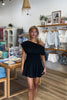 Black, jersey mini dress with asymmetric off shoulder neckline, smocked waist, and flared skirt, little black dress, party dress, Pixelated Boutique, Women's Clothing, Virginia Beach Clothing Stores, Clothing Stores in Virginia Beach, Virginia Beach Boutique, 757 Boutique, Online Shopping for Women