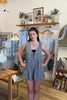 Black, gingham romper with V neckline, front tie, and pleated back
Pixelated Boutique, summer aesthetic, brunch outfit, vacation style, vacation outfits, beach boutique, beach fashion, beach outfits, women’s boutique clothing, boutique clothing for women, coastal cowgirl outfits, coastal aesthetic clothing, business casual, concert outfit, 2000s fashion, western outfits, july 4th outfit