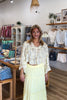 Yellow, floral blouse with lace trim and panelling, quarter sleeves, button down, and cropped length, boho blouse, summer aesthetic, brunch outfit, vacation style, vacation outfits, beach boutique, beach fashion, beach outfits, women’s boutique clothing, boutique clothing for women, coastal cowgirl outfits, coastal aesthetic clothing