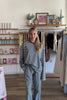 Blue, striped top with crew neckline, long sleeves, and drop shoulder