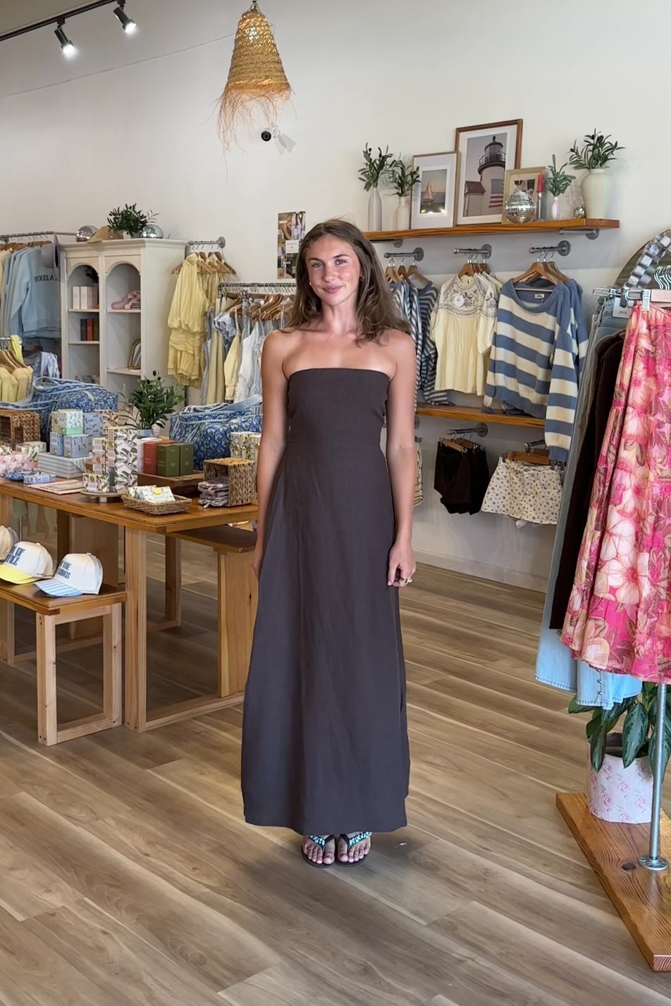 Brown, strapless linen maxi dress with flared hem and smocked back | Pixelated Boutique, Women's Clothing, Boutique Clothing for Women, Women’s Formal Dress, Women’s Occasion Dress, Maxi Dress, Wedding Guest Dress, Prom Dress, Graduation Party Dress 